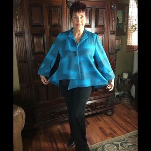 BRIGHT AQUA BLUE AND BLACK WOMANS JACKET